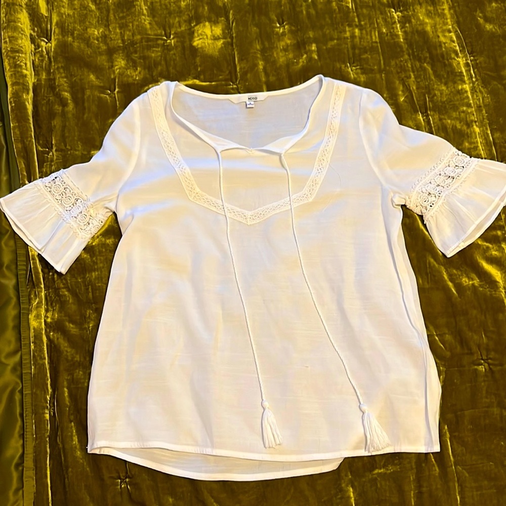 White flowy top